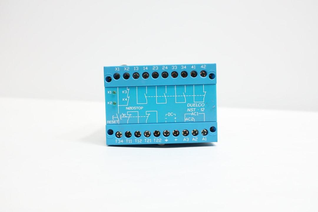 DUELCO NST-12 SAFETY RELAY 230V-AC 24V-DC